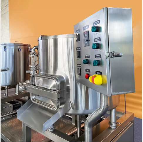 Stainless steel brewing machine with control panel and safety features.